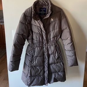 Long winter jacket. 100% polyester. Very warm!